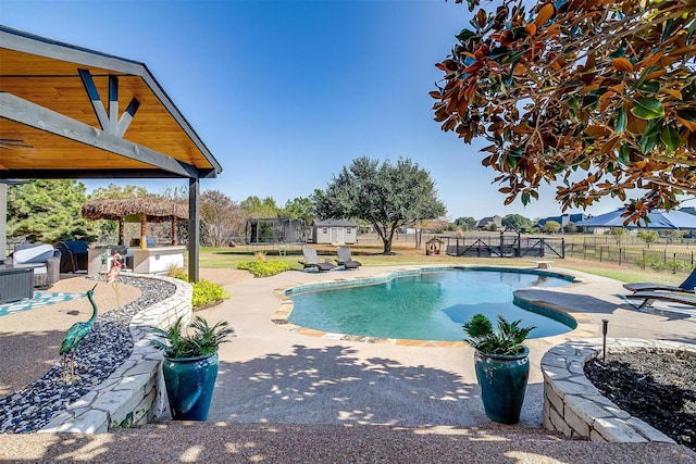 view of pool featuring a patio, a gazebo, a fenced in pool, and a fenced backyard