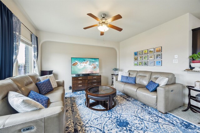 living room with ceiling fan