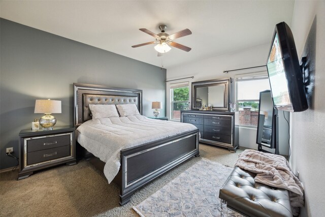 bedroom featuring carpet flooring and a ceiling fan