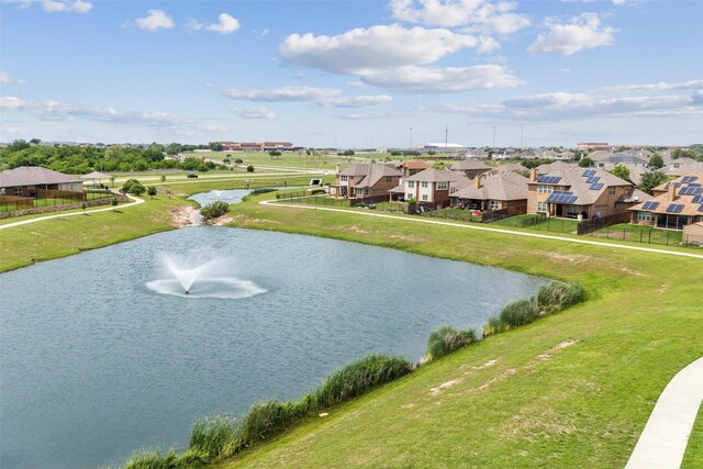 aerial view featuring a water view and a residential view