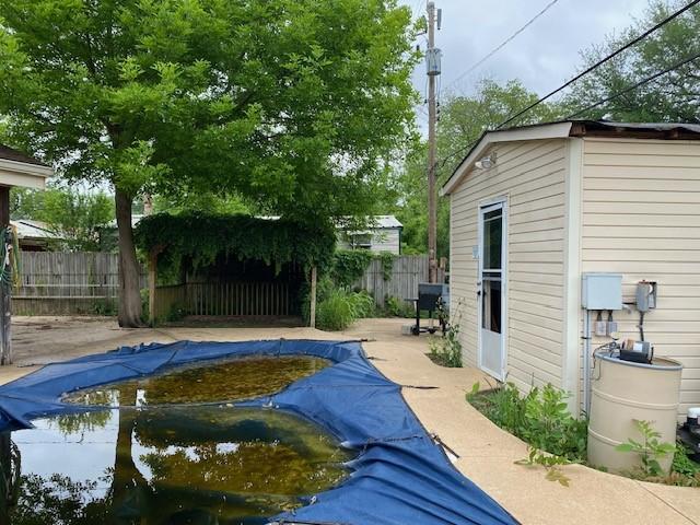view of swimming pool with a fenced backyard and a fenced in pool