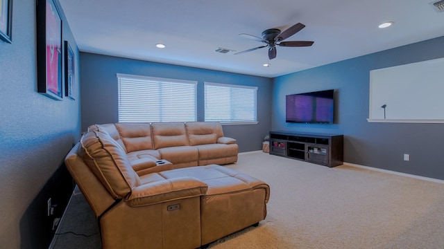 carpeted living area with a ceiling fan, baseboards, visible vents, and recessed lighting