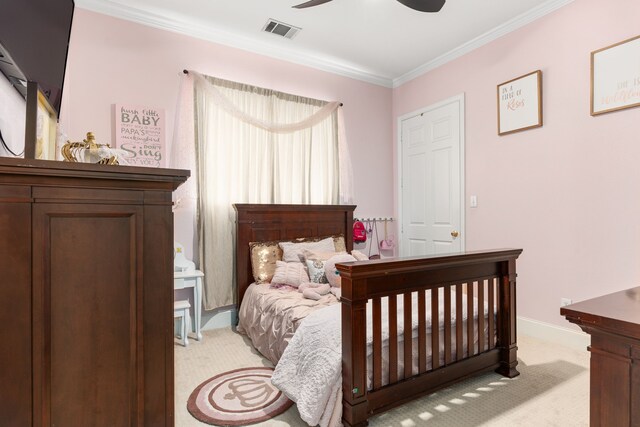 bedroom featuring ceiling fan, light colored carpet, baseboards, visible vents, and ornamental molding
