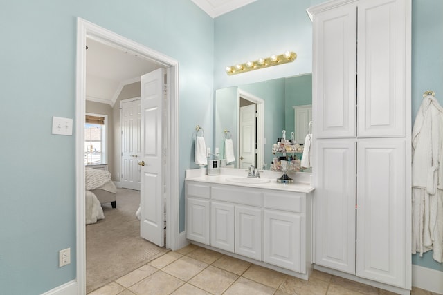 bathroom with vanity, crown molding, ensuite bath, and tile patterned floors