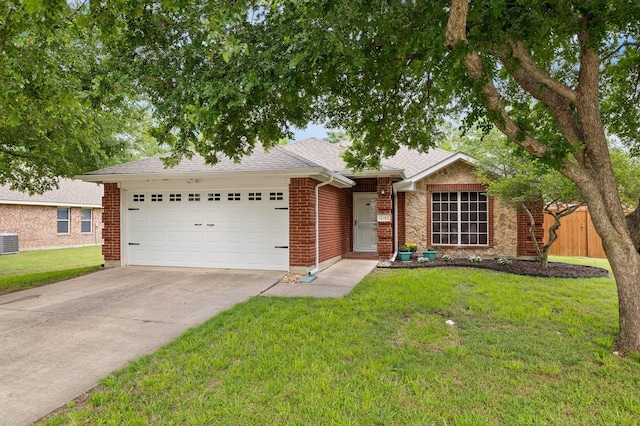ranch-style home with driveway, roof with shingles, central AC unit, a front lawn, and an attached garage