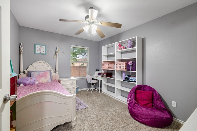 bedroom featuring carpet floors, baseboards, and ceiling fan