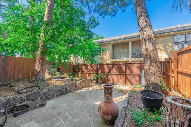 view of yard with a patio and a fenced backyard