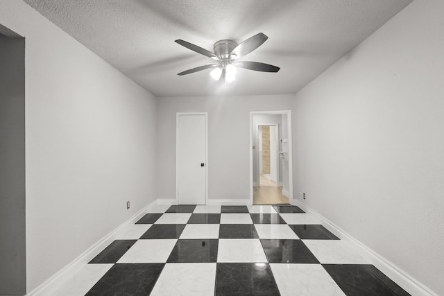 3544 Parker Rd E, Haltom City, TX 76117 - unfurnished room featuring baseboards, ceiling fan, and a textured ceiling