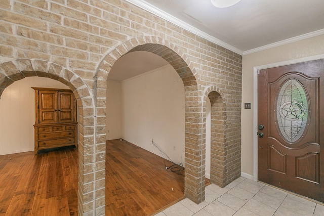 836 Springdale Rd, Bedford, TX 76021 - foyer with arched walkways, ornamental molding, and light wood-type flooring