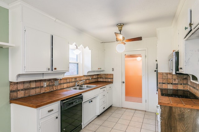 836 Springdale Rd, Bedford, TX 76021 - kitchen featuring a sink, white cabinets, backsplash, and black dishwasher