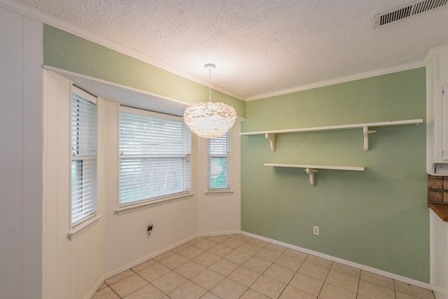 836 Springdale Rd, Bedford, TX 76021 - unfurnished dining area featuring visible vents, ornamental molding, baseboards, a textured ceiling, and a chandelier