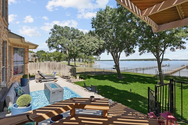 8913 Sunrise Point Ct, Fort Worth, TX 76135 - view of patio with a water view and an outdoor fire pit