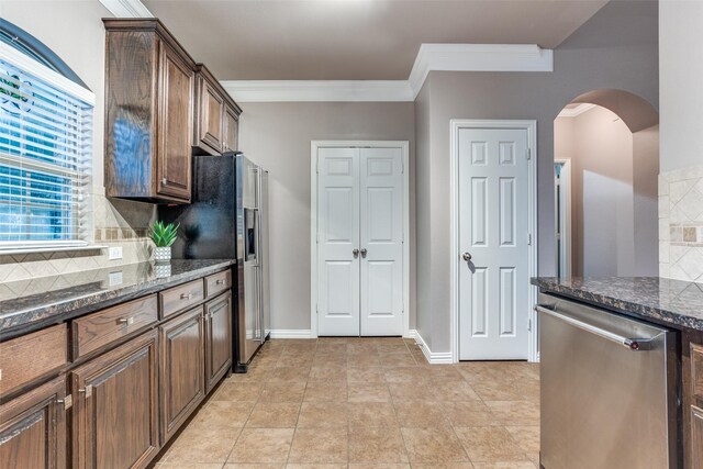 bedroom featuring baseboards, visible vents, ornamental molding, and dark wood-type flooring