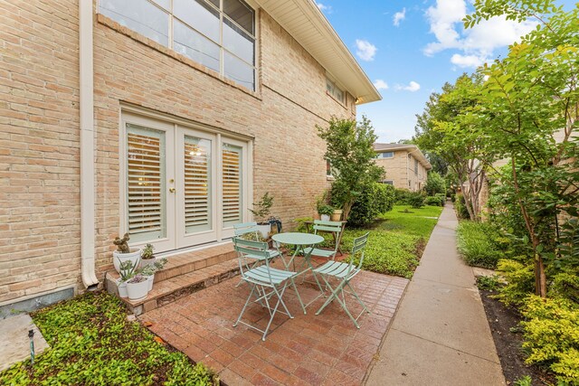 view of patio / terrace featuring french doors and outdoor dining area
