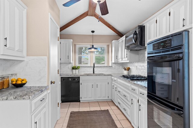 kitchen featuring decorative backsplash, a ceiling fan, a sink, black appliances, and white cabinetry
