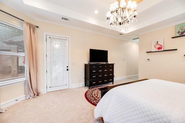 carpeted bedroom with a chandelier, visible vents, ornamental molding, and a raised ceiling