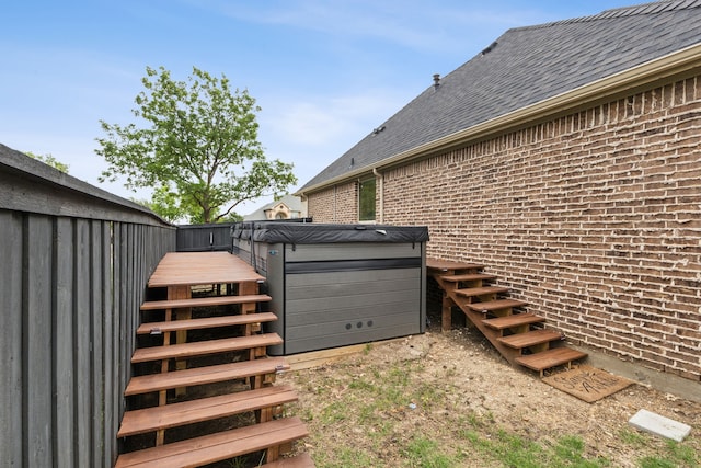 exterior space with stairs and a deck
