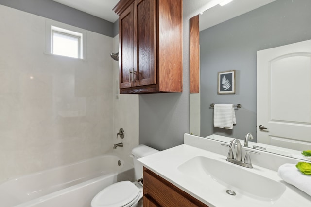 full bathroom with shower / bath combination, vanity, and toilet