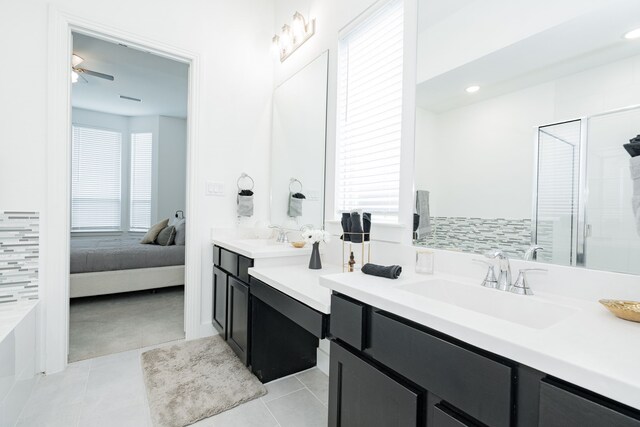 1925 Braided Mane Ave, Aubrey, TX 76227 - bedroom with light colored carpet, ensuite bathroom, baseboards, and visible vents