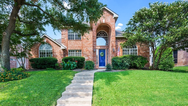 1230 Covina Ct, Allen, TX 75013 - traditional home featuring a front yard and brick siding