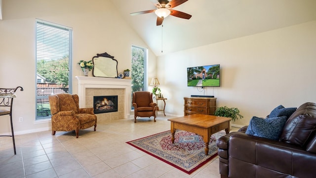 1230 Covina Ct, Allen, TX 75013 - living area with a ceiling fan, high vaulted ceiling, light tile patterned floors, baseboards, and a tile fireplace