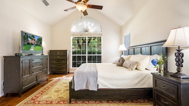 1230 Covina Ct, Allen, TX 75013 - bedroom with wood finished floors, vaulted ceiling, and a ceiling fan