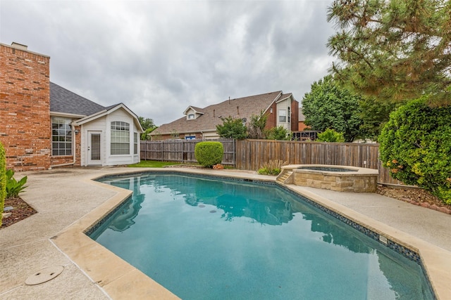 view of pool with a fenced in pool, a fenced backyard, and a patio area