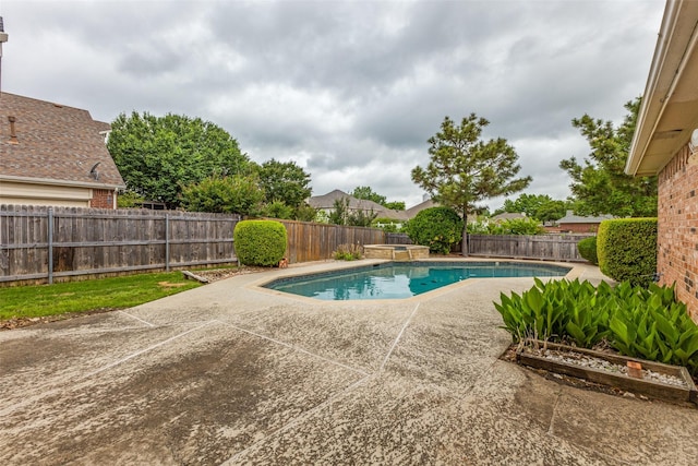 view of swimming pool with a fenced in pool, a fenced backyard, and a patio area