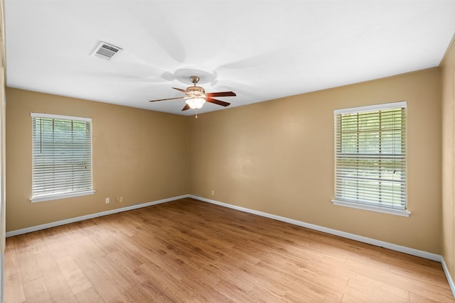 603 Sunnyvale Ln, Fairfield, TX 75840 - unfurnished room with visible vents, a ceiling fan, baseboards, and light wood-style flooring