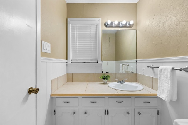 603 Sunnyvale Ln, Fairfield, TX 75840 - bathroom with vanity and a wainscoted wall