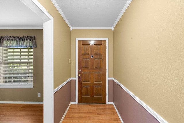 603 Sunnyvale Ln, Fairfield, TX 75840 - doorway to outside featuring baseboards, ornamental molding, and light wood-style flooring