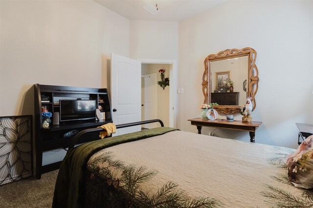 bedroom featuring carpet