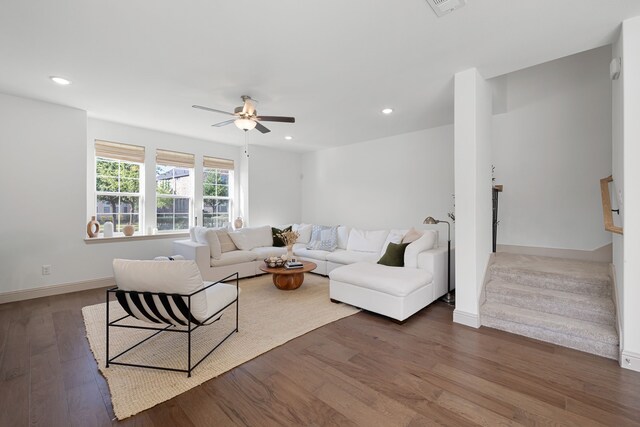 living area featuring baseboards, ceiling fan, recessed lighting, and wood finished floors