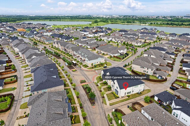 aerial view with a water view and a residential view