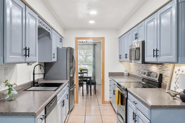 517 Curts Dr, Grand Prairie, TX 75052 - kitchen featuring crown molding, light tile patterned flooring, a sink, stainless steel appliances, and tasteful backsplash