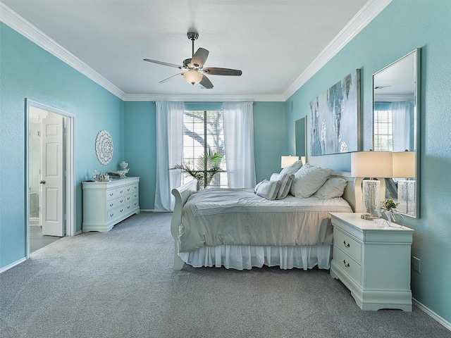 carpeted bedroom with baseboards, ornamental molding, and ceiling fan