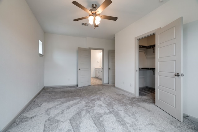 4402 Cypress Thorn Dr, Arlington, TX 76005 - unfurnished bedroom with carpet, a spacious closet, baseboards, and a closet