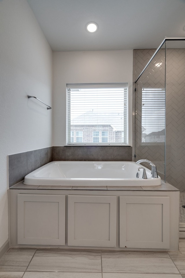 4402 Cypress Thorn Dr, Arlington, TX 76005 - bathroom with a bath and tiled shower