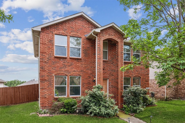 3065 Coolwood Ln, Rockwall, TX 75032 - traditional-style home featuring a front lawn and brick siding
