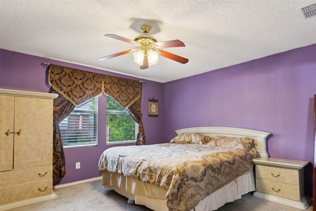 3065 Coolwood Ln, Rockwall, TX 75032 - bedroom with carpet flooring, a textured ceiling, ceiling fan, and baseboards