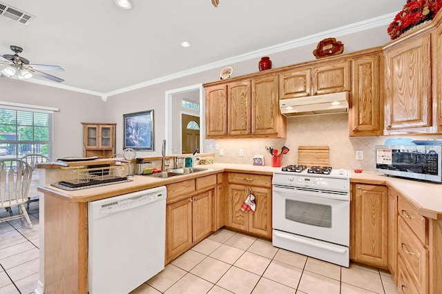 113 Ginger Dr, Pottsboro, TX 75076 - kitchen featuring white appliances, under cabinet range hood, a sink, light tile patterned flooring, and a peninsula
