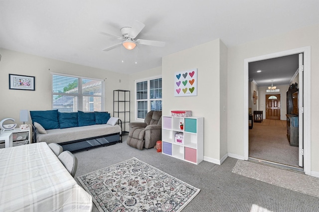 113 Ginger Dr, Pottsboro, TX 75076 - bedroom with carpet floors, baseboards, ceiling fan, and a chandelier