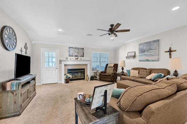 113 Ginger Dr, Pottsboro, TX 75076 - living area with crown molding, carpet, ceiling fan, baseboards, and a tiled fireplace