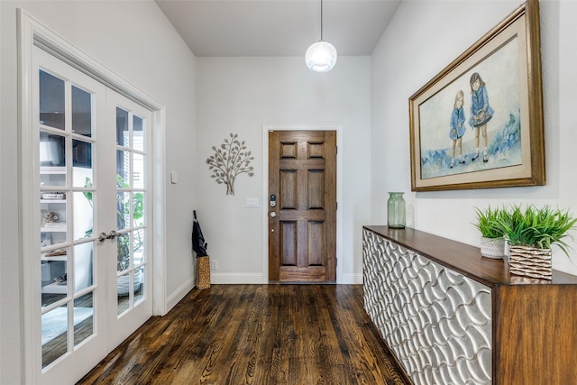 entryway with baseboards, french doors, and dark wood-style floors