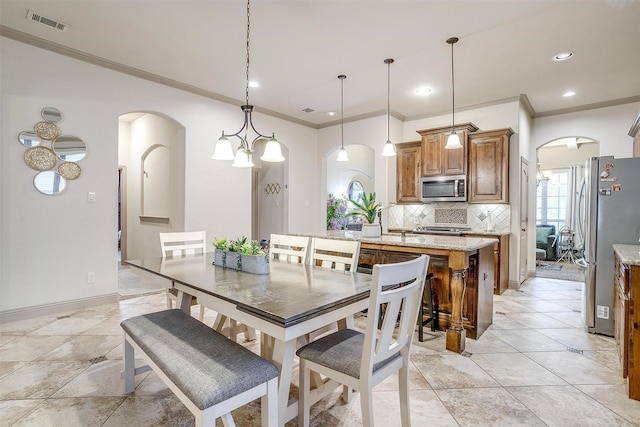 8357 Blue Periwinkle Ln, Fort Worth, TX 76123 - dining space featuring visible vents, arched walkways, recessed lighting, and ornamental molding