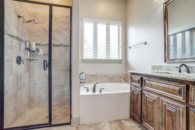 8357 Blue Periwinkle Ln, Fort Worth, TX 76123 - bathroom with a shower stall, a garden tub, and vanity