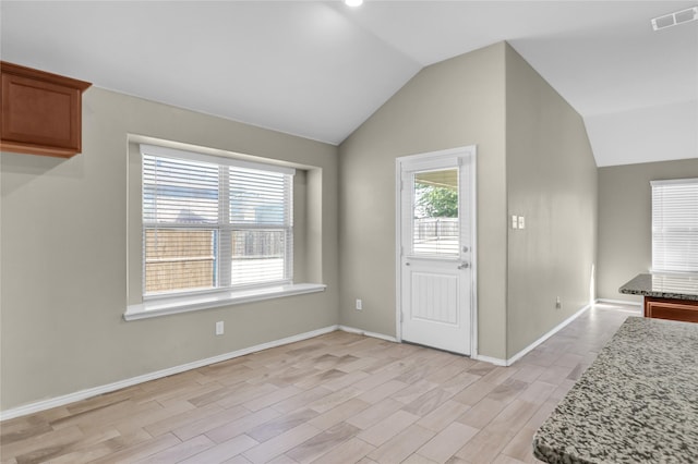 5320 Creek Hill Ln, Fort Worth, TX 76179 - entryway with vaulted ceiling, light wood-style floors, and baseboards