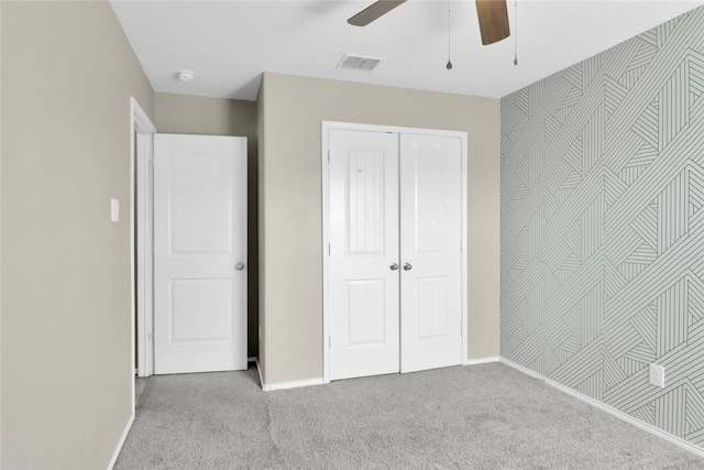 5320 Creek Hill Ln, Fort Worth, TX 76179 - unfurnished bedroom featuring carpet floors, wallpapered walls, an accent wall, baseboards, and a closet