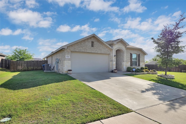 5320 Creek Hill Ln, Fort Worth, TX 76179 - view of front facade with brick siding, an attached garage, cooling unit, driveway, and stone siding