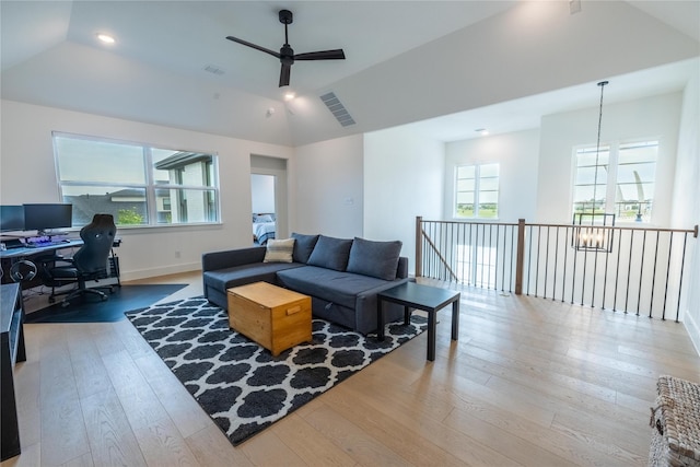 1400 Island Vista Dr, Arlington, TX 76005 - living room featuring wood-type flooring, vaulted ceiling, a wealth of natural light, and ceiling fan with notable chandelier